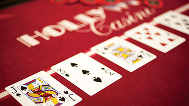 playing cards on red table